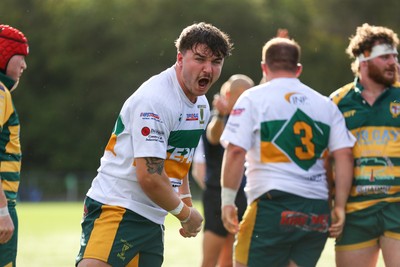 101026 - Merthyr v Beddau - Admiral WRU Premiership - Evan Wood of Merthyr celebrates a solid defensive set