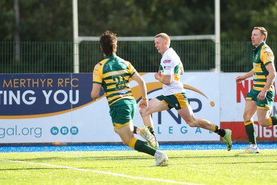 101026 - Merthyr v Beddau - Admiral WRU Premiership - Cole Swannack of Merthyr runs in to score another try