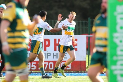 101026 - Merthyr v Beddau - Admiral WRU Premiership - Cole Swannack of Merthyr celebrates his try