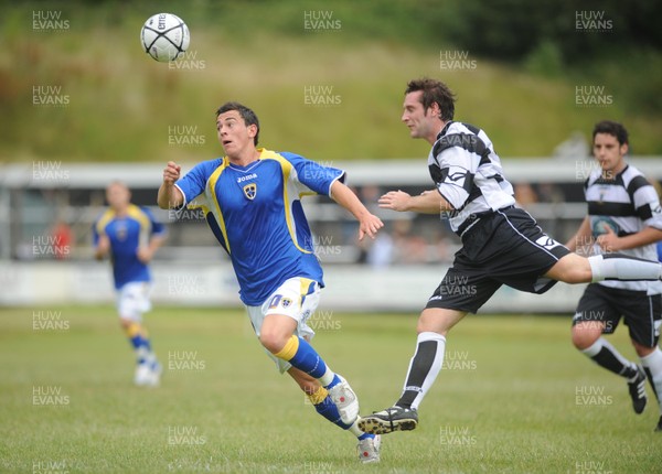 12.07.08 - Pre season Friendly Merthyr Tydfil v Cardiff City XI Cardiff's Jon Brown is challenged by Merthyr's Steve Williams 