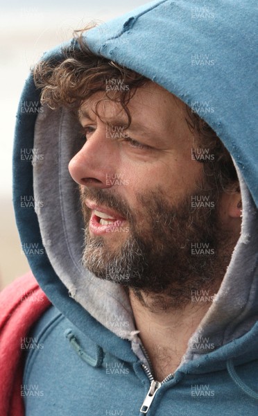 22.04.11 - The Passion with Michael Sheen, Aberavon Beach, south Wales. Michael Sheen playing the part of The Schoolteacher during his performance in The Passion on Aberavon Beach, south Wales 