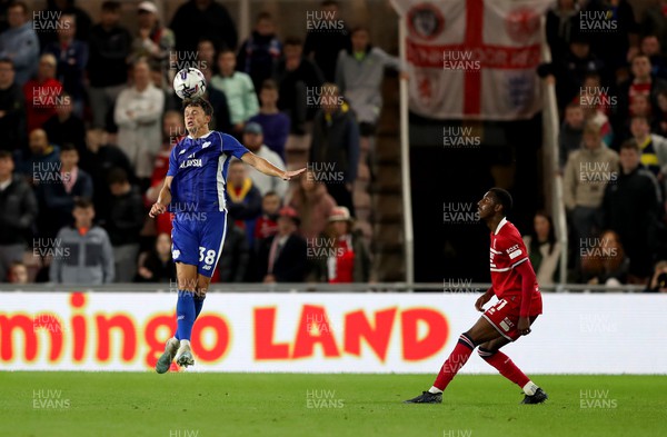 031023 - Middlesbrough v Cardiff City - Sky Bet Championship - Isaiah Jones of Middlesbrough and Perry Ng of Cardiff City
