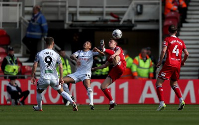 060424 - Middlesbrough v Swansea City - Sky Bet Championship - Luke Thomas of Middlesbrough and Lewis Webb of Swansea City