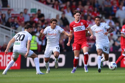 090825 - Middlesbrough v Swansea City - Sky Bet Championship - Swansea City's Goncalo Franco & Ronald in action with Middlesbrough's Hayden Hackney 