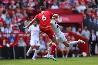 090825 - Middlesbrough v Swansea City - Sky Bet Championship - Middlesbrough's Dael Fry batltles with Swansea City's Liam Cullen