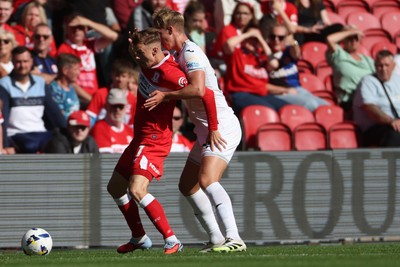 090825 - Middlesbrough v Swansea City - Sky Bet Championship - Swansea City's Melker Widell battles for the ball with Middlesbrough's Marcus Forss