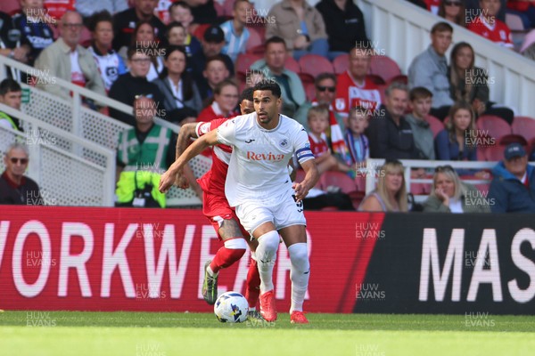 090825 - Middlesbrough v Swansea City - Sky Bet Championship - Swansea City's Ben Cabango in action with Middlesbrough's Delano Burgzorg 