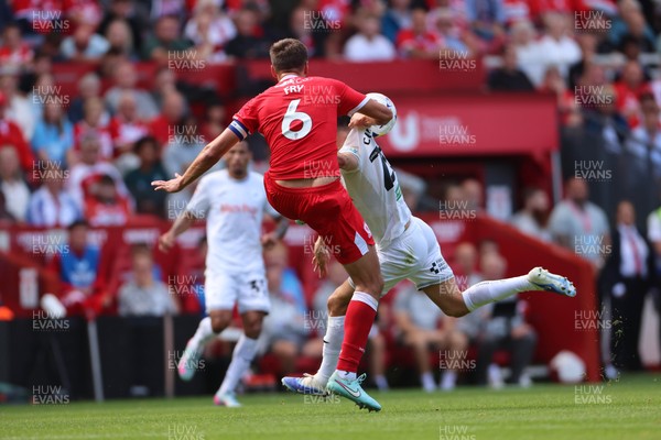 090825 - Middlesbrough v Swansea City - Sky Bet Championship - Middlesbrough's Dael Fry batltles with Swansea City's Liam Cullen