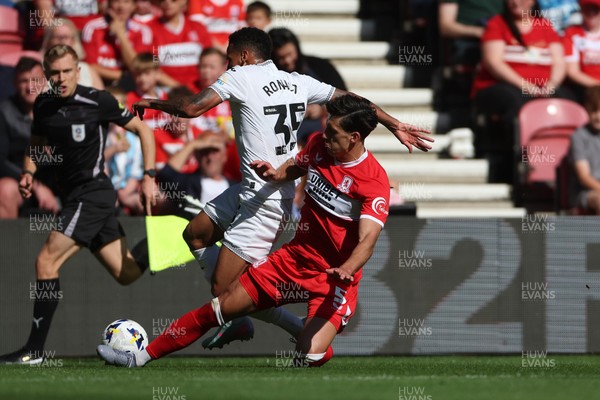 090825 - Middlesbrough v Swansea City - Sky Bet Championship - Middlesbrough's Alfie Jones battles for possession with Swansea City's Ronald