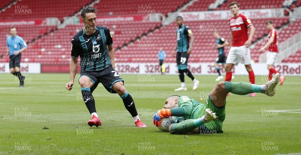 200620 - Middlesbrough v Swansea City - Sky Bet Championship - Dejan Stojanovic of Middlesbrough saves at the foot of Connor Roberts of Swansea in the 2nd half