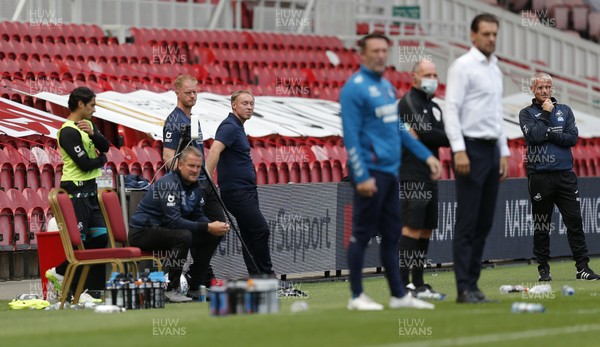 200620 - Middlesbrough v Swansea City - Sky Bet Championship - Manager Steve Cooper of Swansea looking relaxed in the 2nd half behind manager Jonathan Woodgate of Middlesbrough
