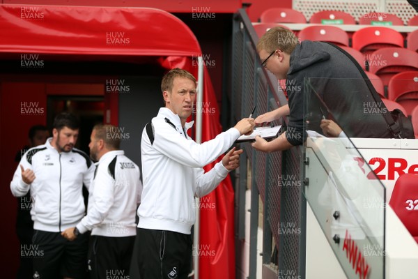 220918 - Middlesbrough v Swansea City - SkyBet Championship - Swansea City manager Graham Potter signs an autograph before kick off