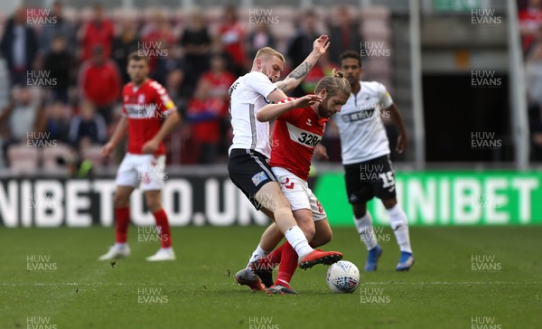 220918 - Middlesbrough v Swansea City - SkyBet Championship - Adam Clayton of Middlesbrough and Oliver McBurnie of Swansea City