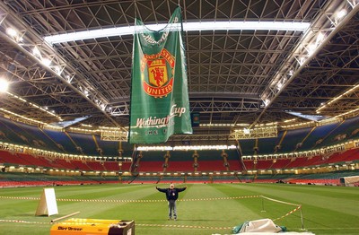 280203 - Groundstaff put branding into place for the Worthington Cup Final at the Millennium Stadium in Cardiff