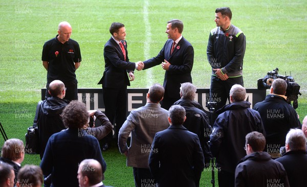 031114 - WRU -Head groundsman Lee Evans, Deputy Minister for Culture, Sport and Tourism Ken Skates, WRU Chief Executive Roger Lewis and Wales International Mike Phillips during the unveiling of the new pitch