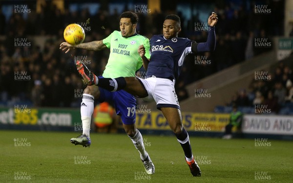 090218 - Millwall v Cardiff City - SkyBet Championship - Nathaniel Mendez-Laing of Cardiff City is tackled by Mahlon Romeo of Millwall