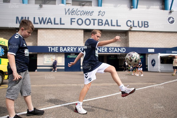 030922 - Millwall v Cardiff City - Sky Bet Championship - Millwall fans play with ball outside the Barry Kitchener Stand at The Den