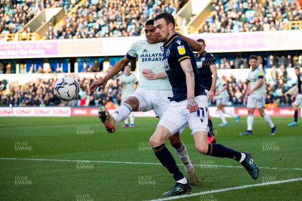 120222 - Millwall v Cardiff City - Sky Bet Championship - Scott Malone of Millwall and Cody Drameh of Cardiff City battle for the ball