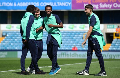 130424 - Millwall v Cardiff City - Sky Bet Championship - Raheem Conte of Cardiff City smiles and jokes with team mates before kick-off