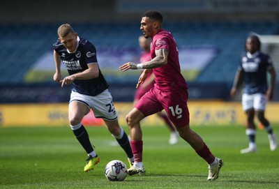 130424 - Millwall v Cardiff City - Sky Bet Championship - Karlan Grant of Cardiff City is pressured by George Saville of Millwall