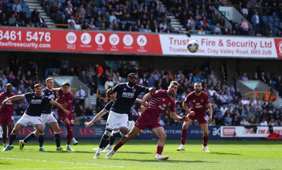 130424 - Millwall v Cardiff City - Sky Bet Championship - Dimitris Goutas of Cardiff City is pressured by Japhet Tanganga of Millwall