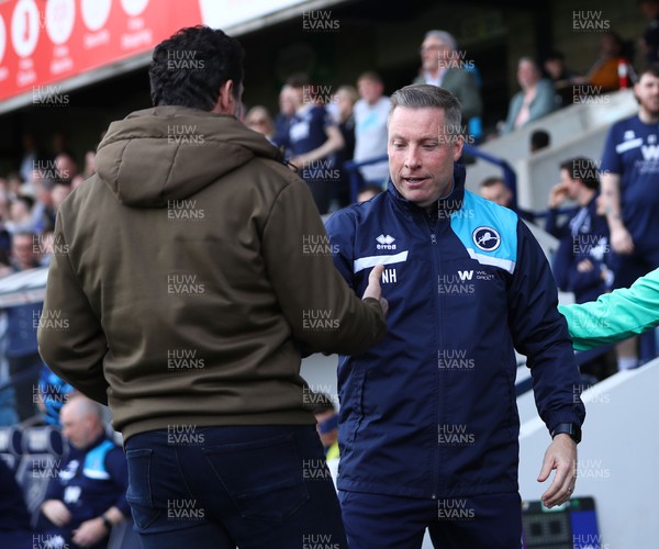 130424 - Millwall v Cardiff City - Sky Bet Championship - Erol Bulut, Manager of Cardiff City shakes hands with Neil Harris, Manager of Millwall ahead of kick-off