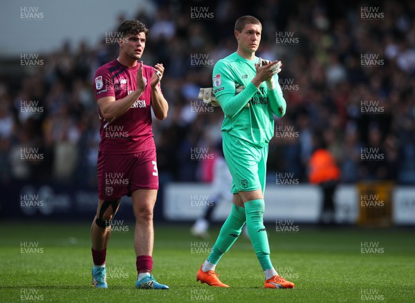 130424 - Millwall v Cardiff City - Sky Bet Championship - Ollie Tanner and Ethan Horvath of Cardiff City applaud fans after the full-time whistle