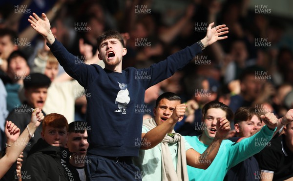 130424 - Millwall v Cardiff City - Sky Bet Championship - Millwall fans celebrate after the final whistle
