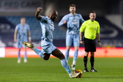 210125 - Millwall v Cardiff City - Sky Bet Championship - Yakou Méïte of Cardiff City shoots