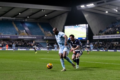 210125 - Millwall v Cardiff City - Sky Bet Championship - Yakou M��te of Cardiff City is challenged by Joe Bryan of Millwall