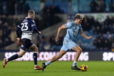 210125 - Millwall v Cardiff City - Sky Bet Championship - Rubin Colwill of Cardiff City and George Saville in action