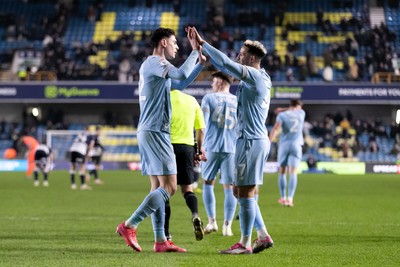 210125 - Millwall v Cardiff City - Sky Bet Championship - Yousef Salech of Cardiff City celebrates with his teammate Callum Robinson of Cardiff City after scoring his side’s second goal to make it 2 - 2