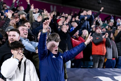 210125 - Millwall v Cardiff City - Sky Bet Championship - Fans of Cardiff City celebrate after a late goal to make it 2 - 2