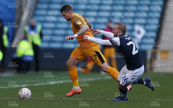 040120 - Millwall v Newport County - FA Cup Round 3 - Scot Bennett of Newport County is tackled by Jiri Skalak of Millwall