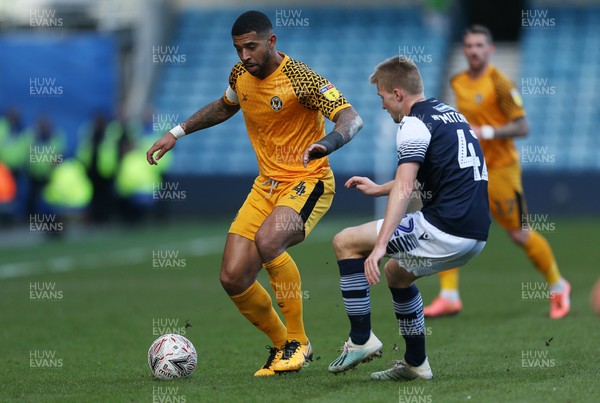 040120 - Millwall v Newport County - FA Cup Round 3 - Joss Labadie of Newport County is challenged by Billy Mitchell of Millwall