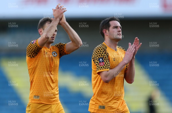 040120 - Millwall v Newport County - FA Cup Round 3 - Mickey Demetriou and Joss Labadie of Newport County thank the fans at full time