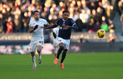 040126 - Millwall v Swansea City, EFL Sky Bet Championship - Thierno Ballo of Millwall and Ronald of Swansea City compete for the ball