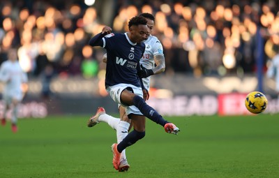 040126 - Millwall v Swansea City, EFL Sky Bet Championship - Thierno Ballo of Millwall and Ronald of Swansea City compete for the ball