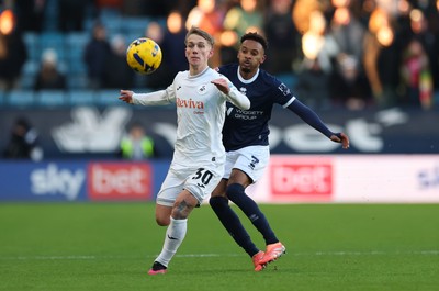 040126 - Millwall v Swansea City, EFL Sky Bet Championship - Ethan Galbraith of Swansea City and Thierno Ballo of Millwall  compete for the ball