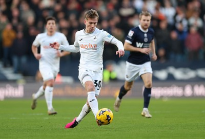 040126 - Millwall v Swansea City, EFL Sky Bet Championship - Ethan Galbraith of Swansea City plays the ball forward