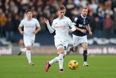 040126 - Millwall v Swansea City, EFL Sky Bet Championship - Ethan Galbraith of Swansea City plays the ball forward