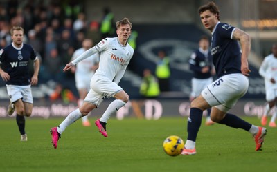 040126 - Millwall v Swansea City, EFL Sky Bet Championship - Ethan Galbraith of Swansea City plays the ball forward