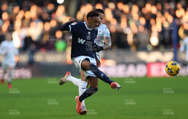 040126 - Millwall v Swansea City, EFL Sky Bet Championship - Thierno Ballo of Millwall and Ronald of Swansea City compete for the ball