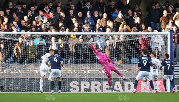 040126 - Millwall v Swansea City, EFL Sky Bet Championship - Swansea City goalkeeper Lawrence Vigouroux tips the ball over the bar