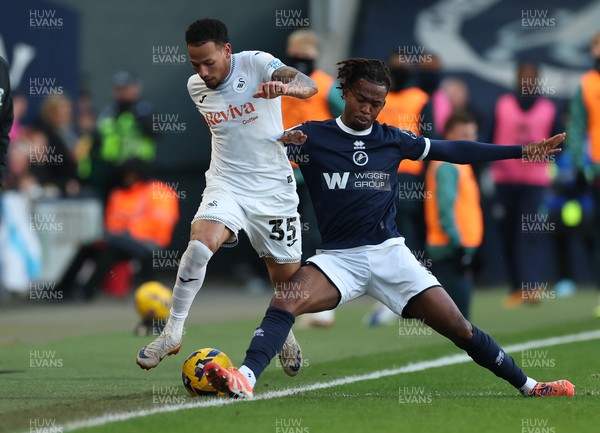 040126 - Millwall v Swansea City, EFL Sky Bet Championship - Ronald of Swansea City takes on Zak Sturge of Millwall