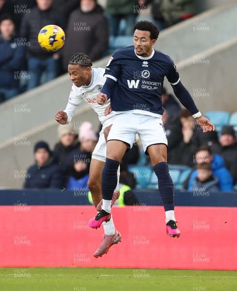 040126 - Millwall v Swansea City, EFL Sky Bet Championship - Femi Azeez of Millwall  and Ishe Samuels-Smith of Swansea City compete for the ball’