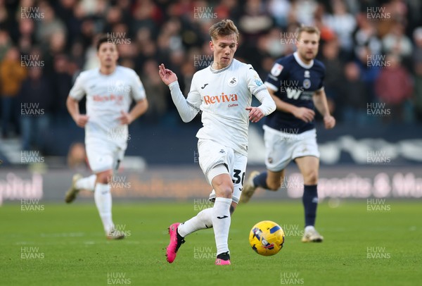 040126 - Millwall v Swansea City, EFL Sky Bet Championship - Ethan Galbraith of Swansea City plays the ball forward