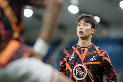 131026 - Millwall v Swansea City - Sky Bet Championship -  Jisung Eom of Swansea City warming up