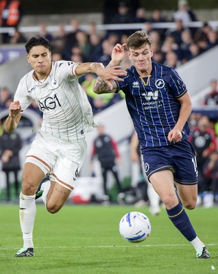 131026 - Millwall v Swansea City - Sky Bet Championship -  Marko Stamenic of Swansea City and Jenson Metcalfe of Millwall in action