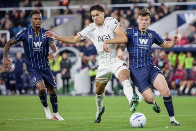 131026 - Millwall v Swansea City - Sky Bet Championship -  Marko Stamenic of Swansea City and Jenson Metcalfe of Millwall in action